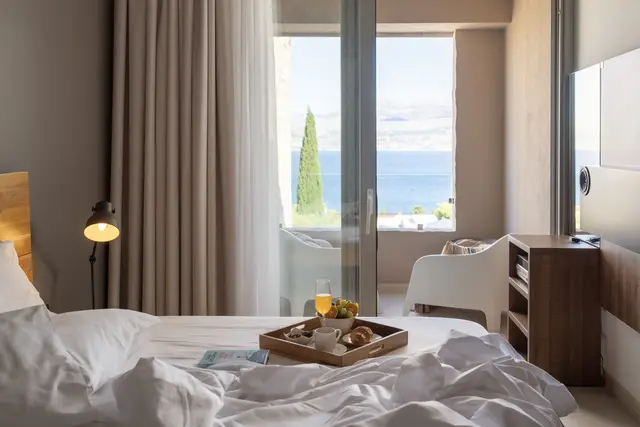 Breakfast in bed, the sea in view