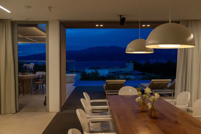 Dining room open to the sea at dusk