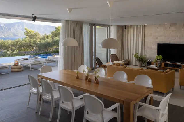 Open-plan living and dining with sea view
