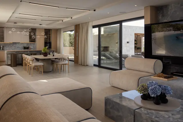 Open-plan living, dining and kitchen running the width of the house