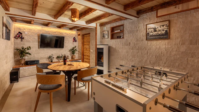 Games room with table football and fireplace